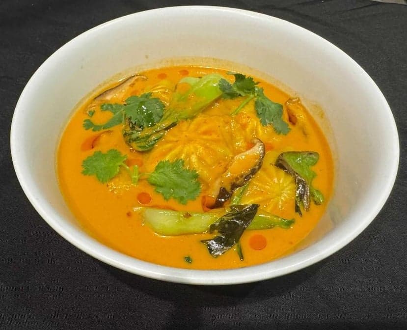 Chicken Soup Dumplings in Thai Coconut Curry Sauce