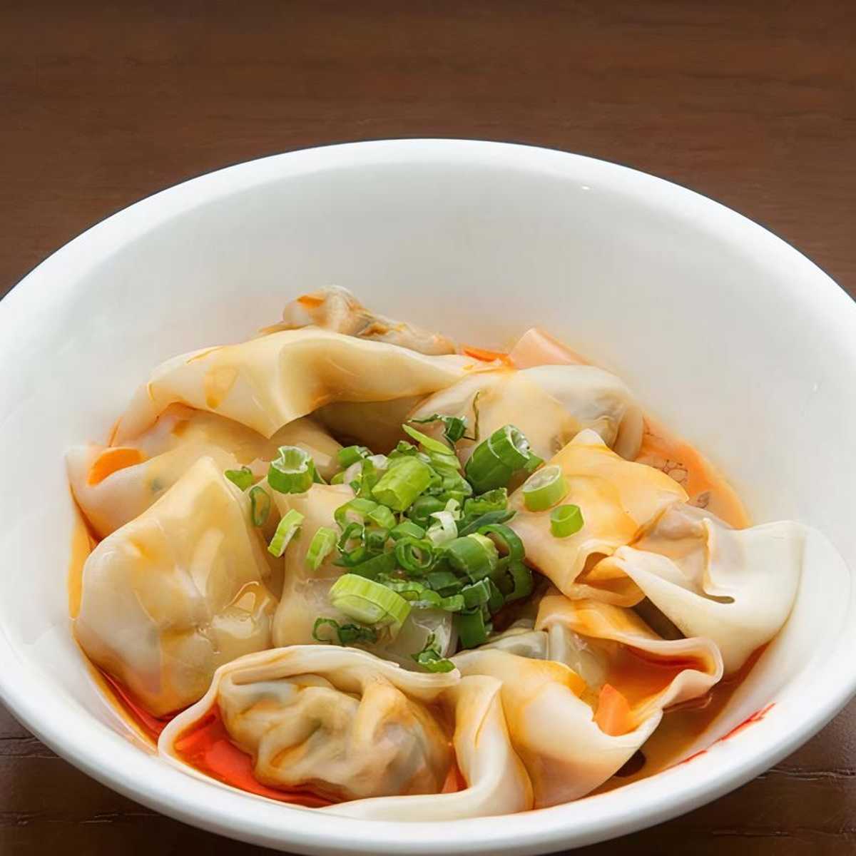 Sesame sauce W. shrimp dumplings