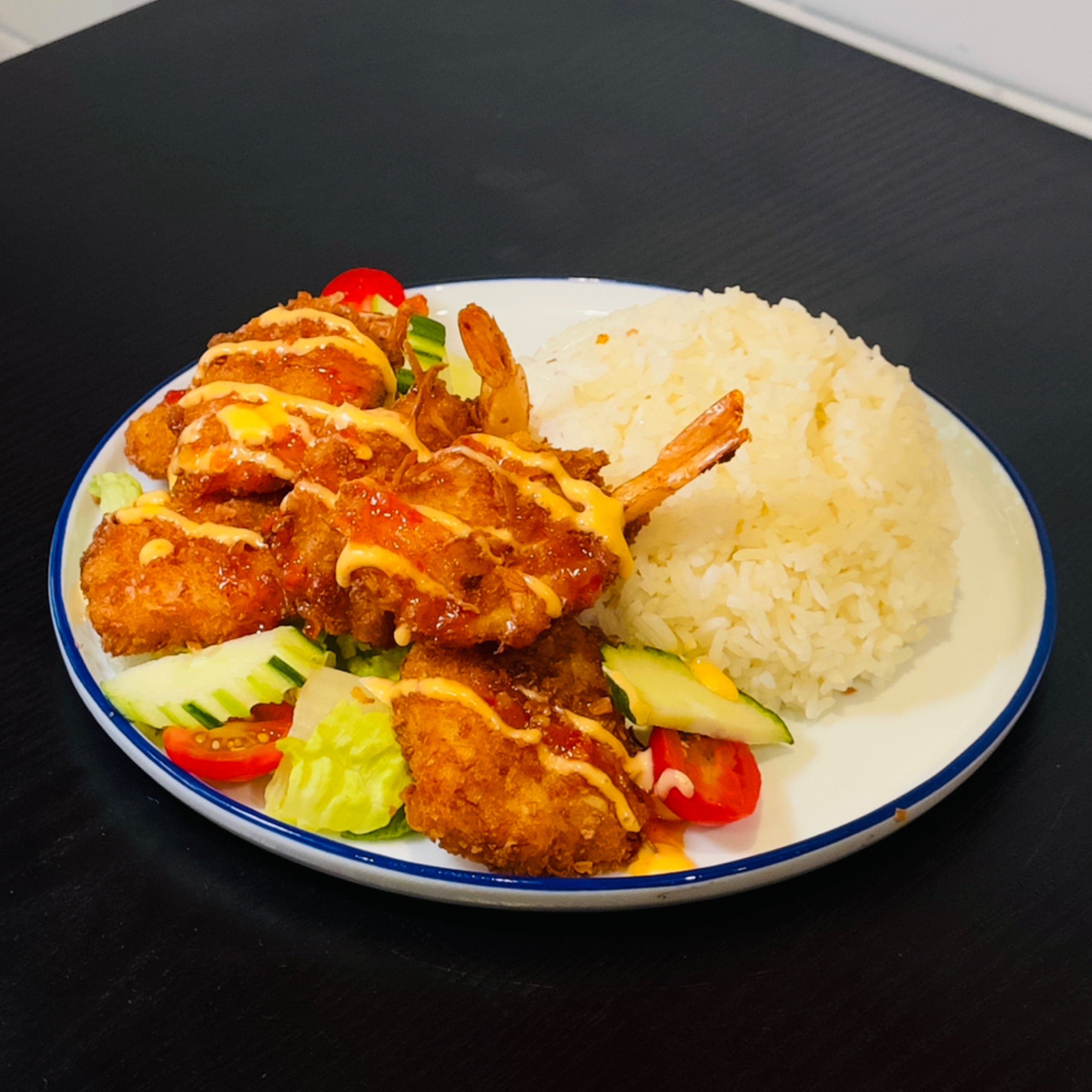 T. Coconut Shrimp Over Rice