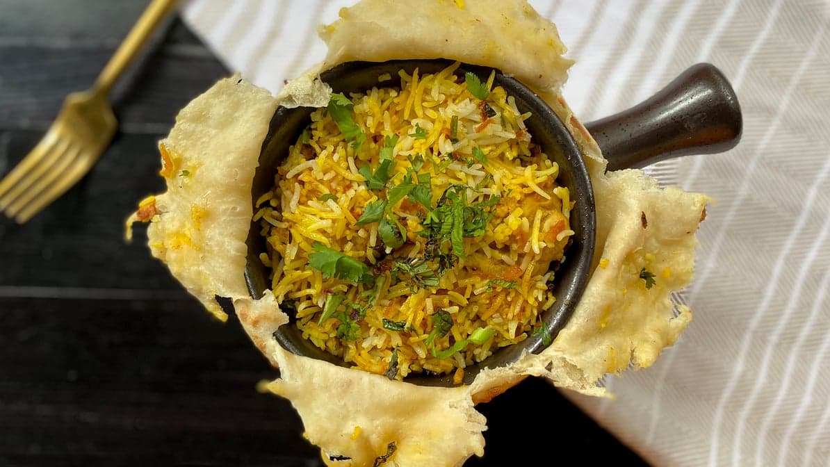 DUM MURGH BIRYANI (boneless chicken)
