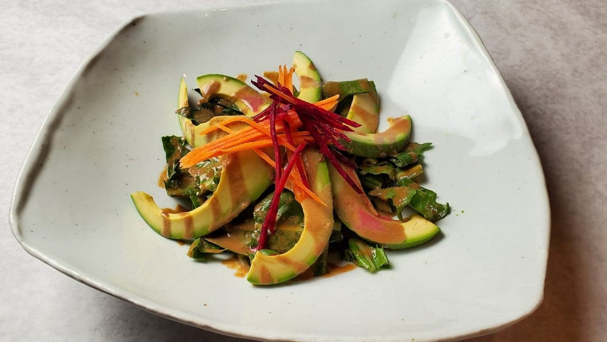 Organic dandelion & avocado salad