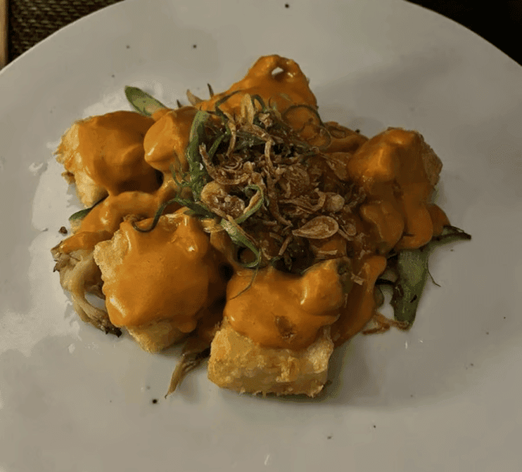 Crispy tofu with maitake mushrooms in creamy sauce