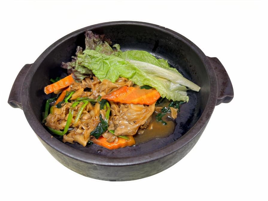 Organic maitake mushrooms with spinach