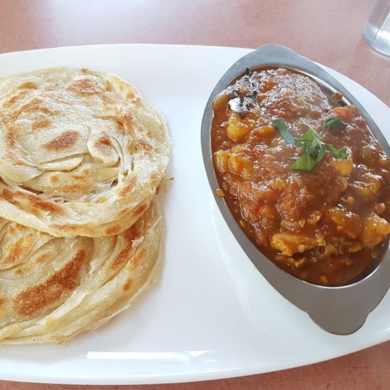 Two Parottas with Chicken Gravy
